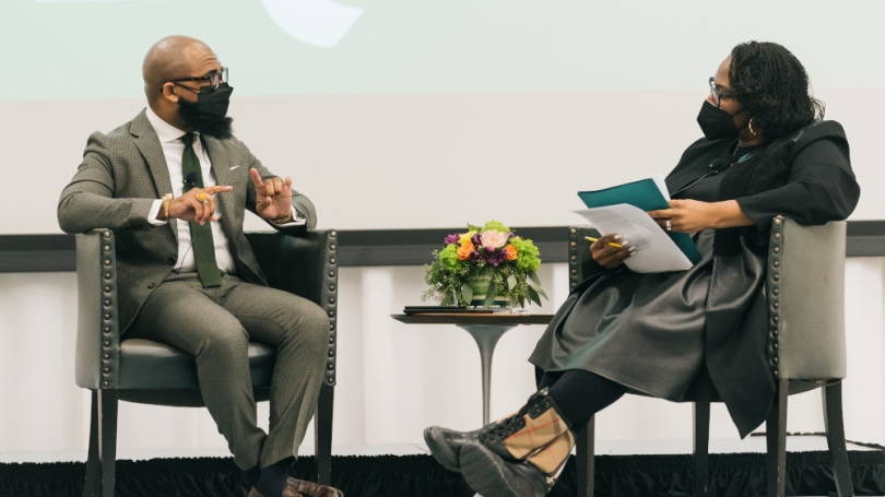     Educator Robert S. Harvey takes questions from Shontay Delalue, senior vice president and senior diversity officer, after his keynote speech.